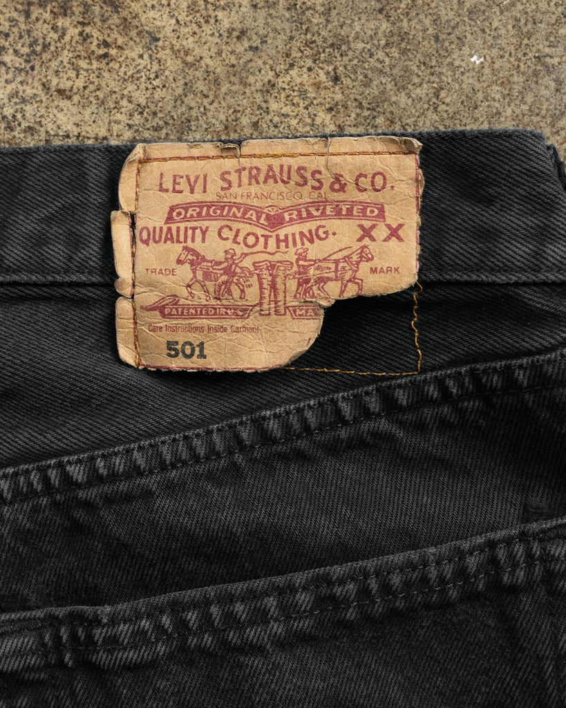 Levi's 501 Faded Blue Black Distressed Jeans - 1990s - detail