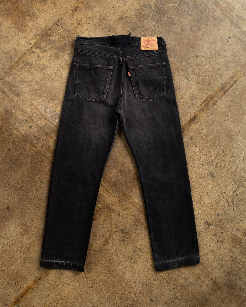 Levi's 501 Faded Black Patched Jeans - 1990s back photo