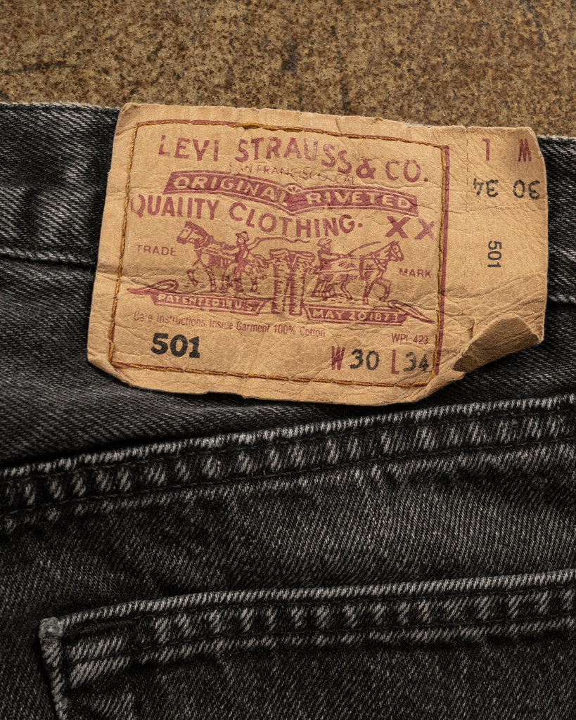 Levi's 501 Faded Black Released Hem Jeans - 1990s back patch photo
