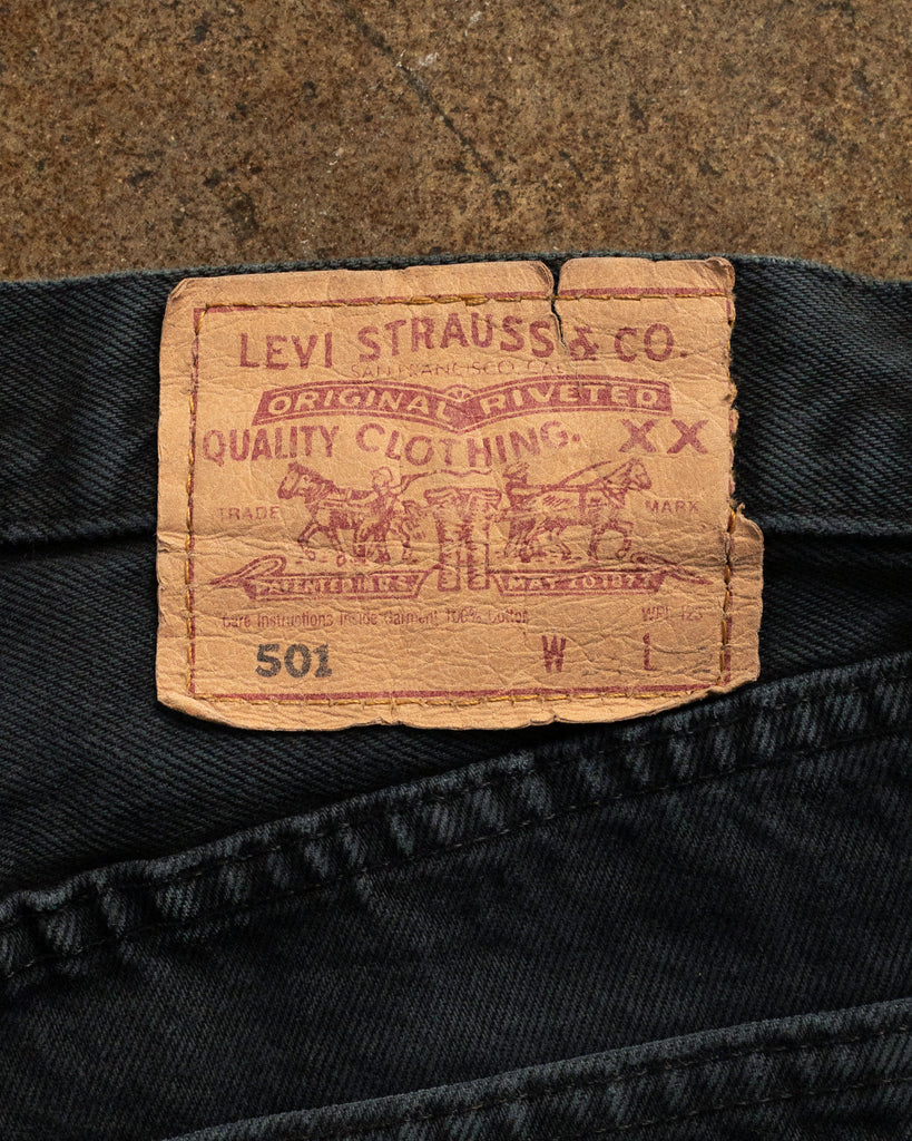 Levi's 501 Faded Blue Black Released Hem Jeans - 1990s back patch